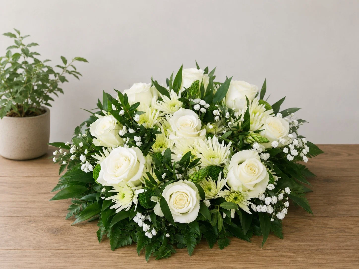 White rose and chrysanthemum funeral posy tribute by Quality Plants and Flowers, Denby Dale