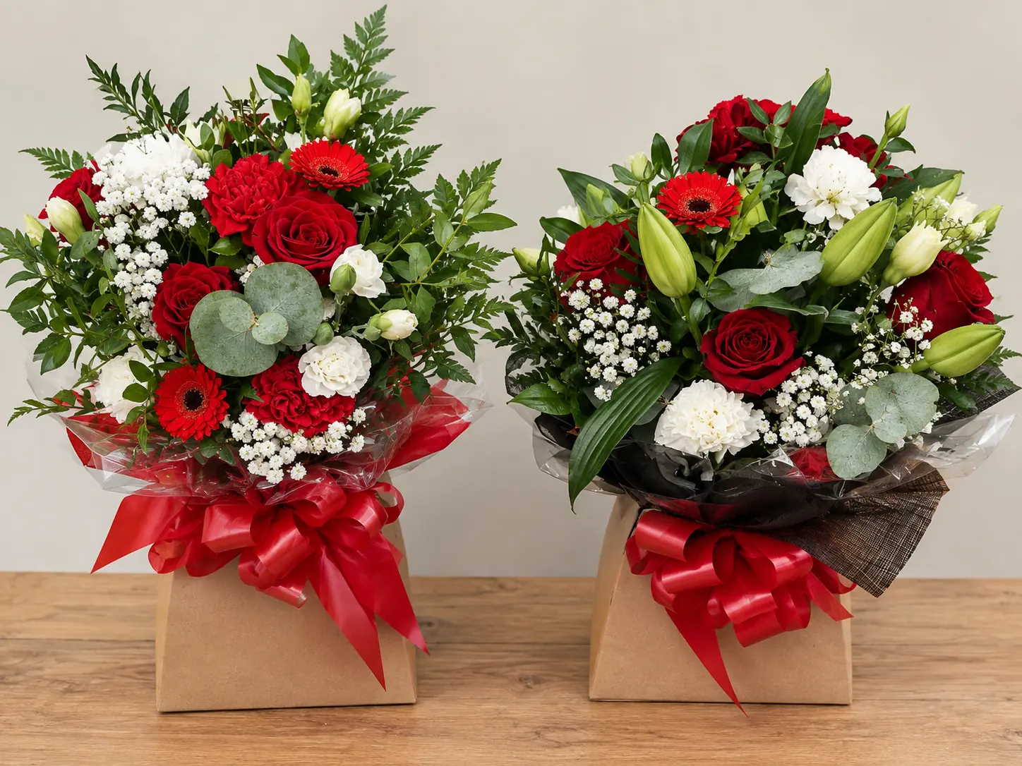 Pair of matching red and white Christmas bouquet boxes