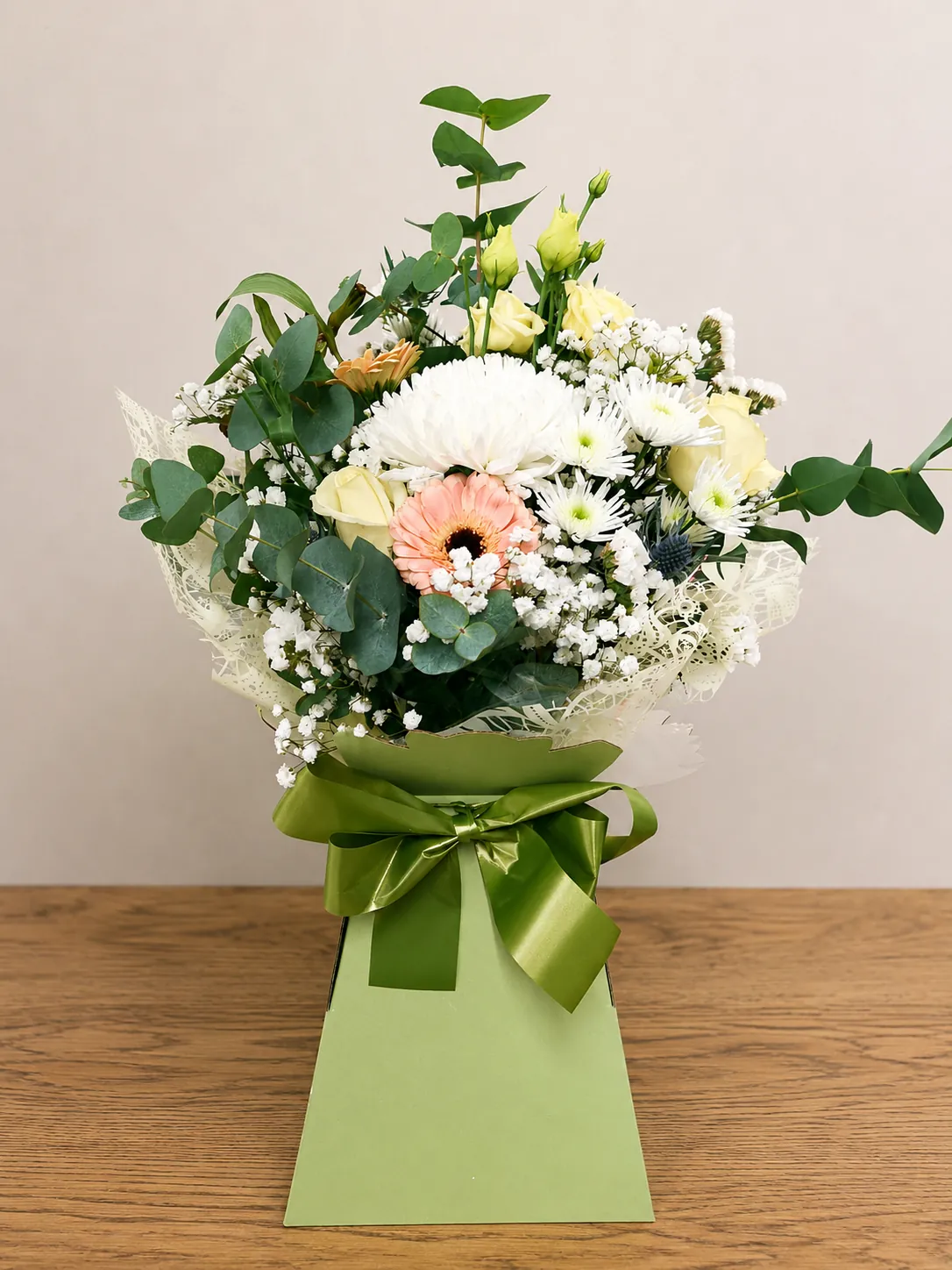 Soft cream and white box arrangement with roses and gerbera