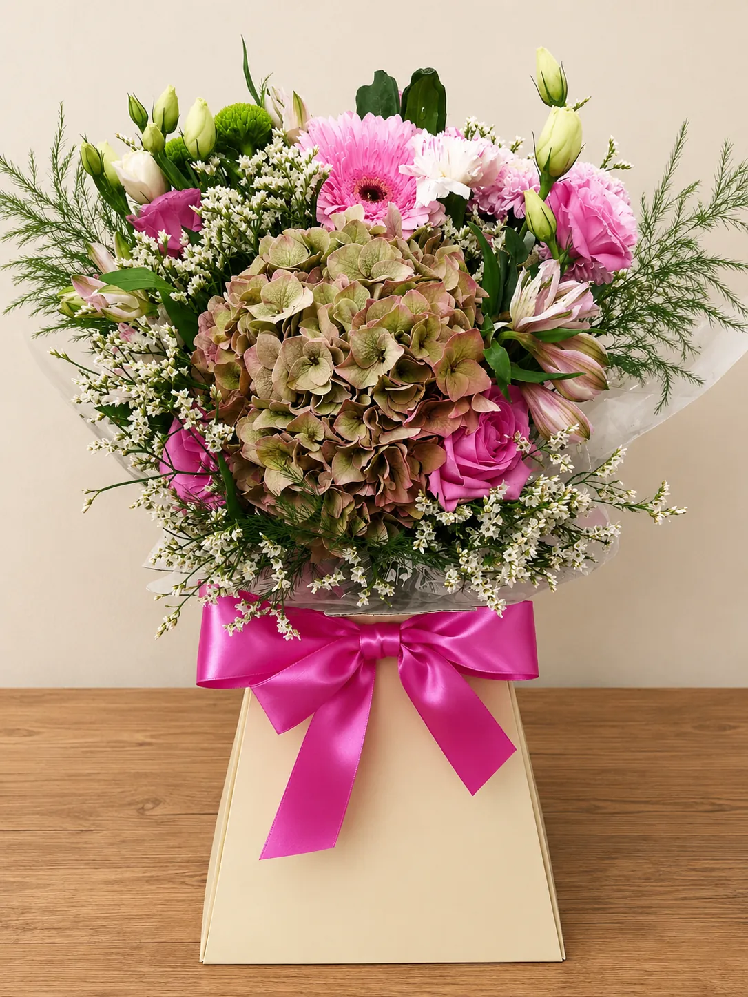 Pink gerbera and chrysanthemum box arrangement in a wooden crate