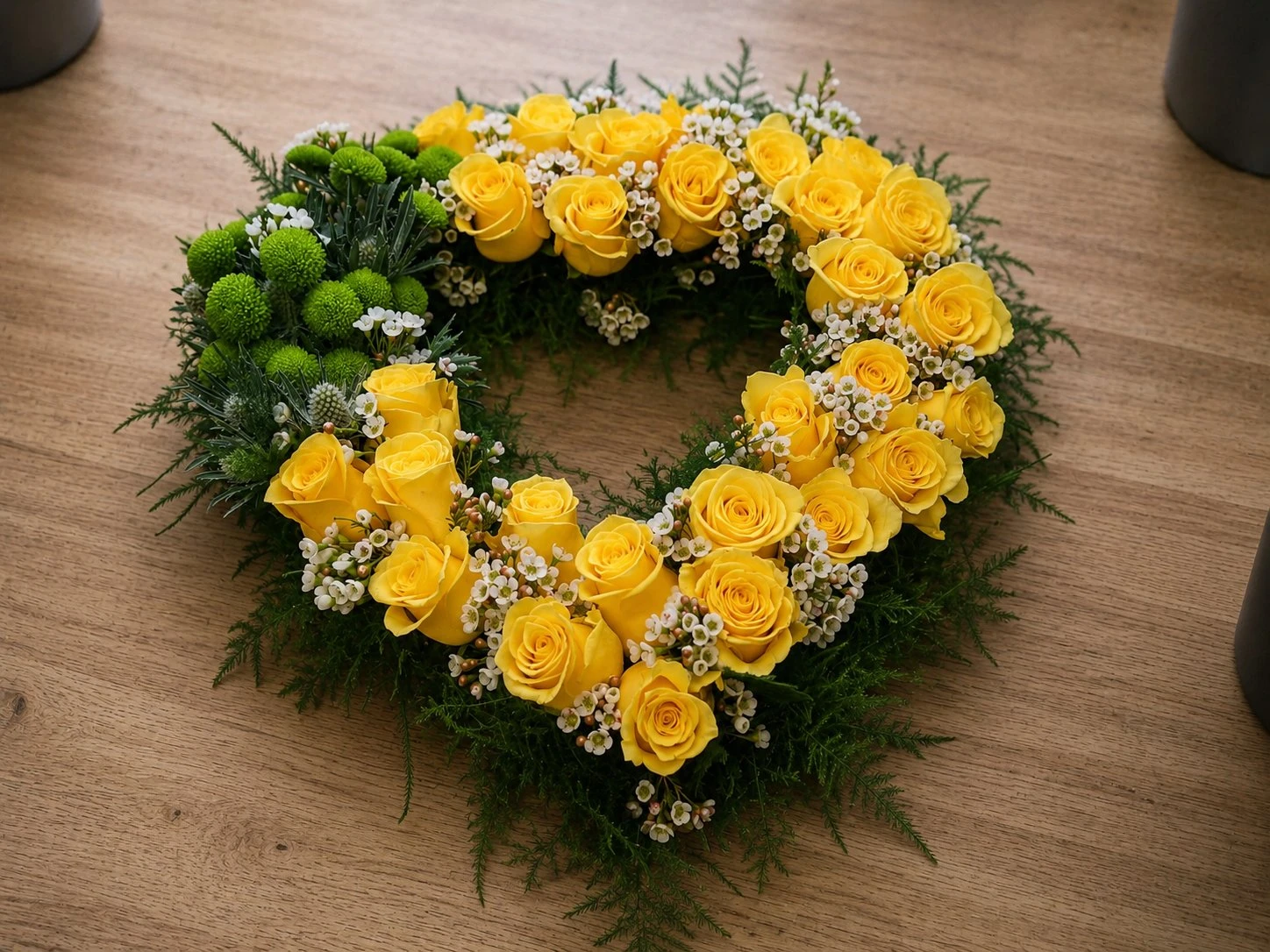 Yellow rose open heart funeral wreath tribute by Quality Plants and Flowers, Denby Dale florist