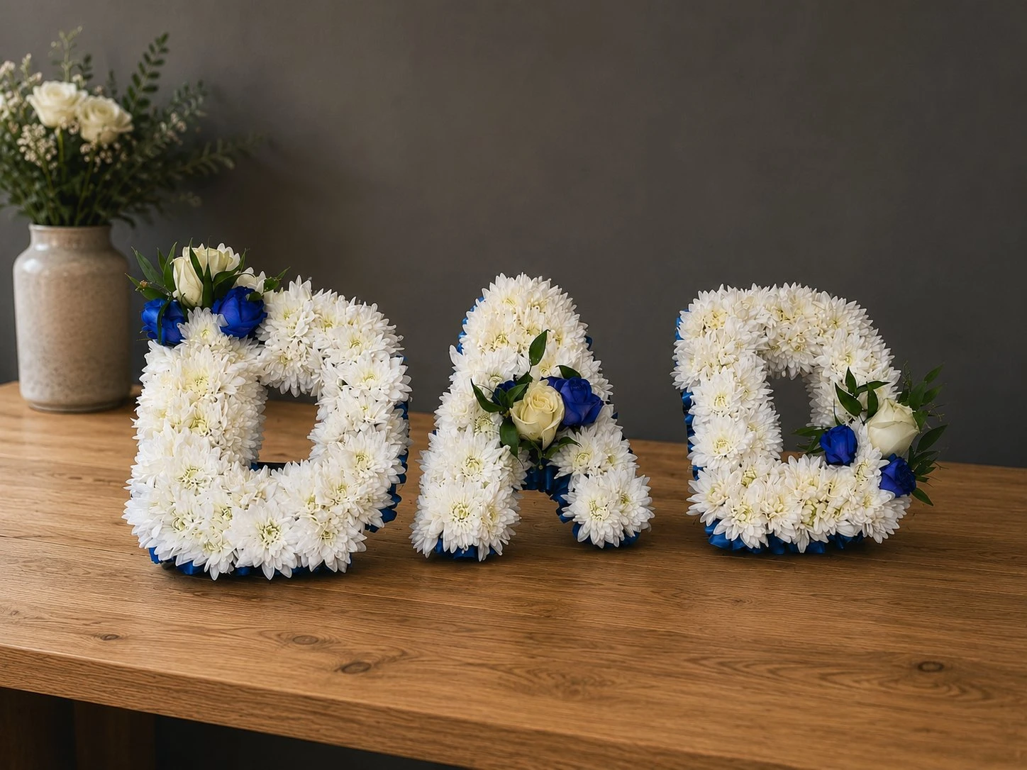 DAD funeral letter tribute in white chrysanthemums and blue roses by Quality Plants and Flowers