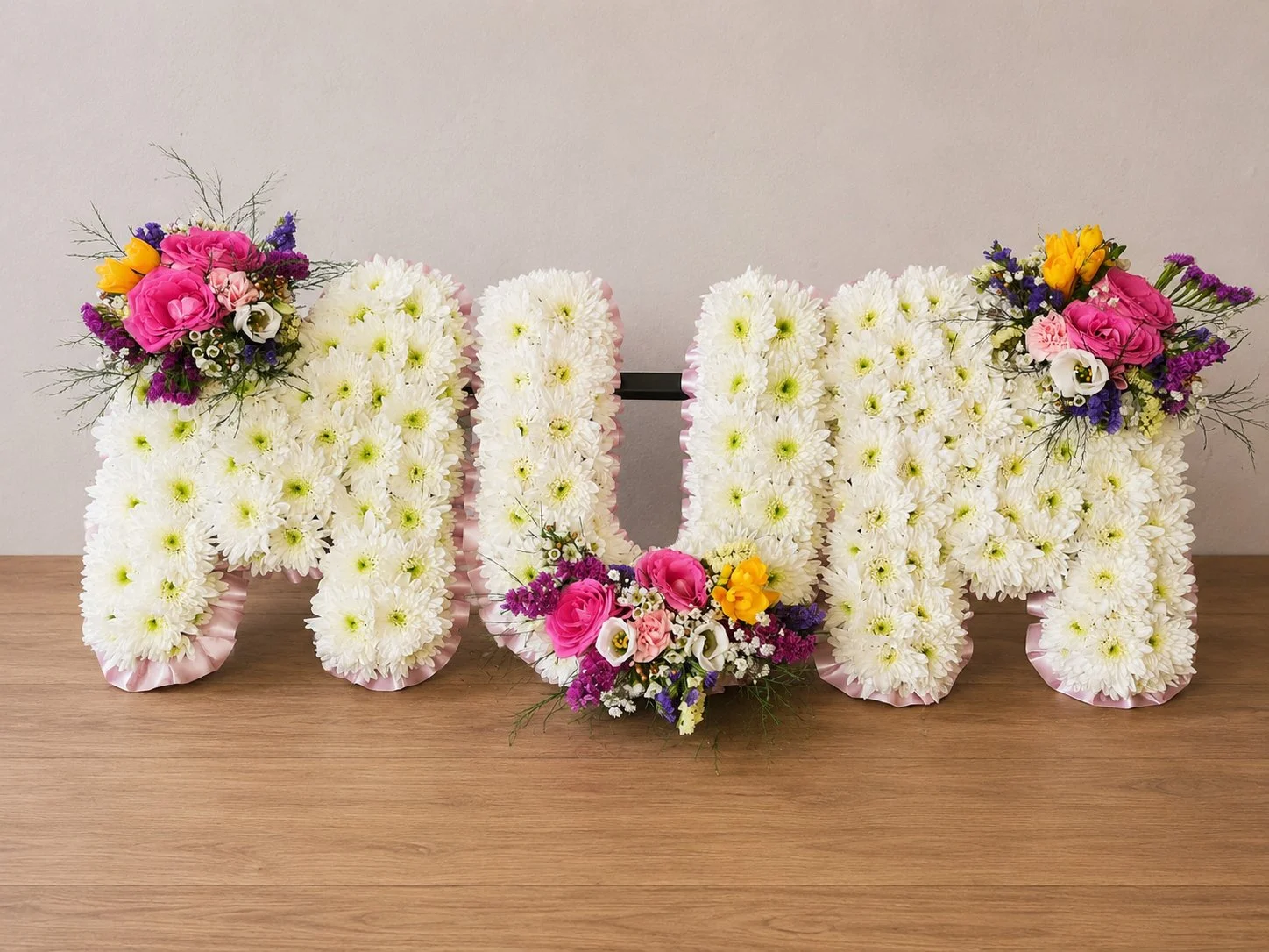 MUM funeral letter tribute in white chrysanthemums with colourful flowers by Quality Plants and Flowers